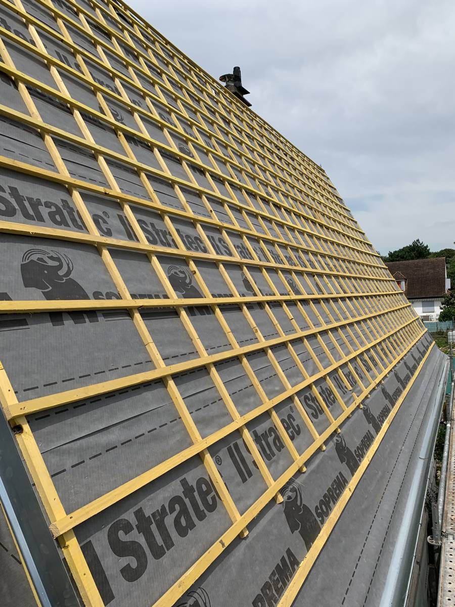 Pose de charpente sur mesure à Châtillon 92020 : confiez votre projet à des experts.