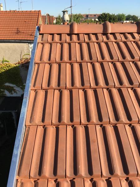 Réparation de toiture Le Vésinet 78110 : intervention sur couverture mixte en tuiles terre cuite et toit aluminium